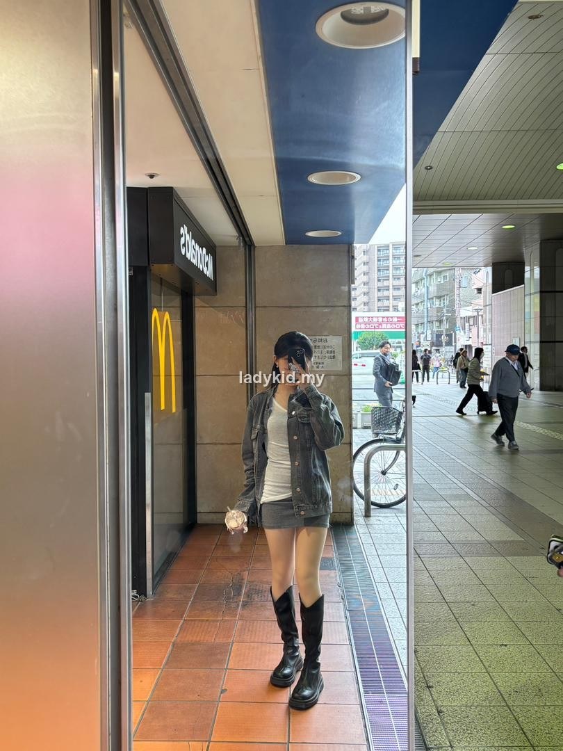 Customer mirror outfit with grey skirt and boots